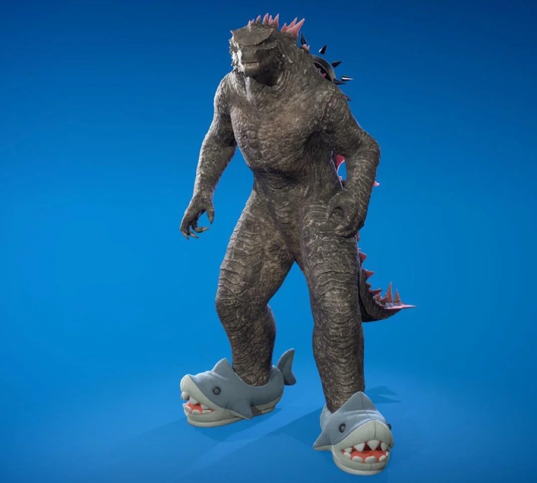 screenshot of godzilla skin wearing a shark slippers in fortnite game